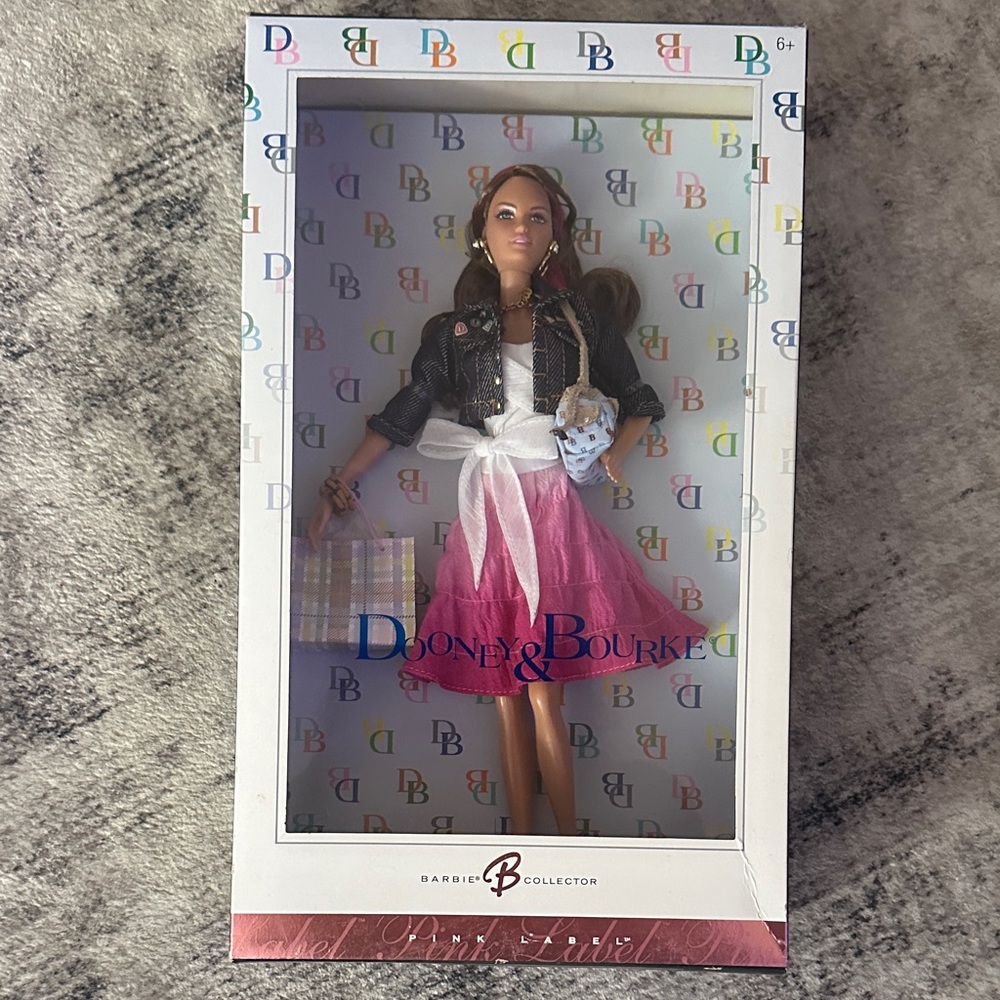 Dooney & Bourke Pink and White Doll